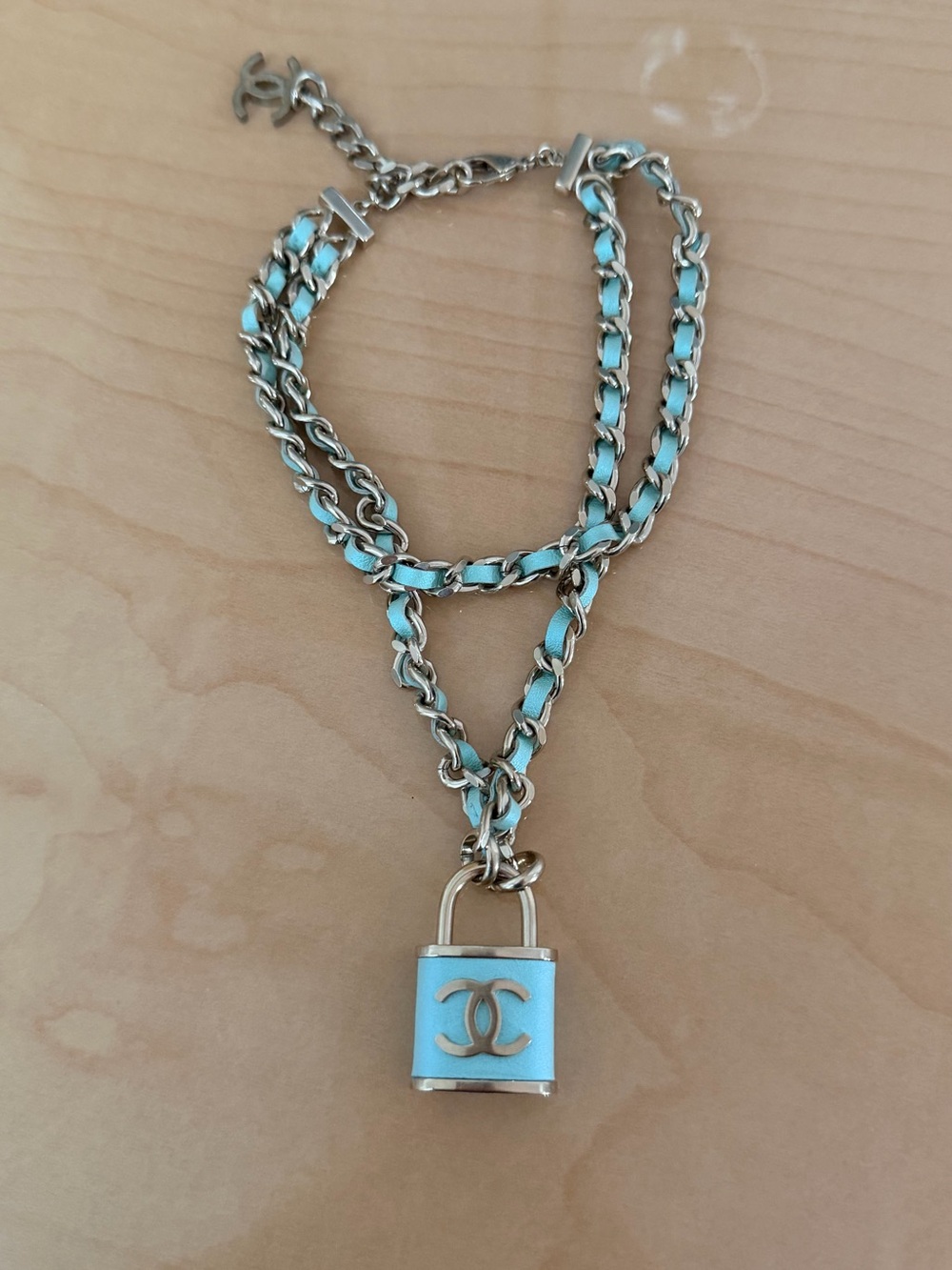 Authentic Chanel Turquoise Blue Leather Interwoven CC Padlock Necklace